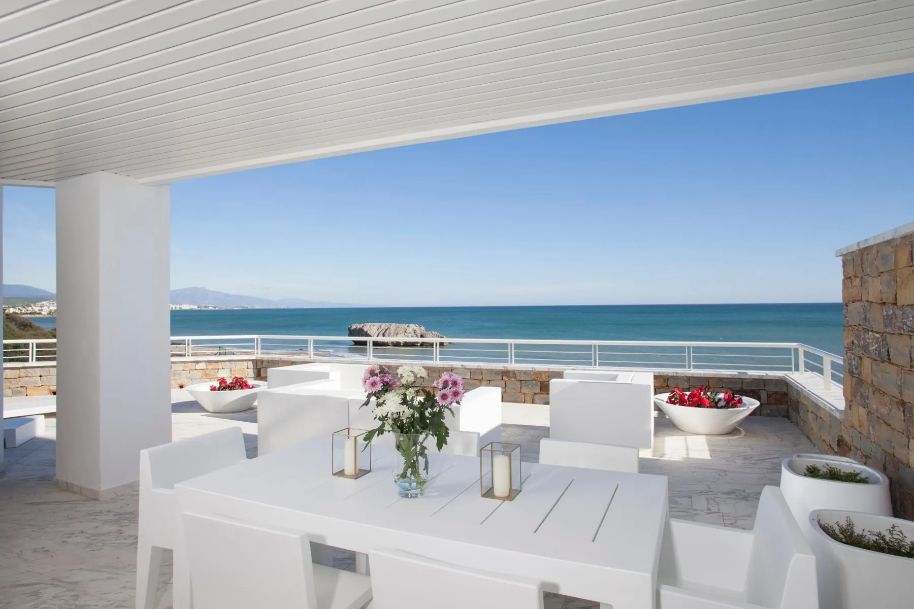Outdoor dining with sea views