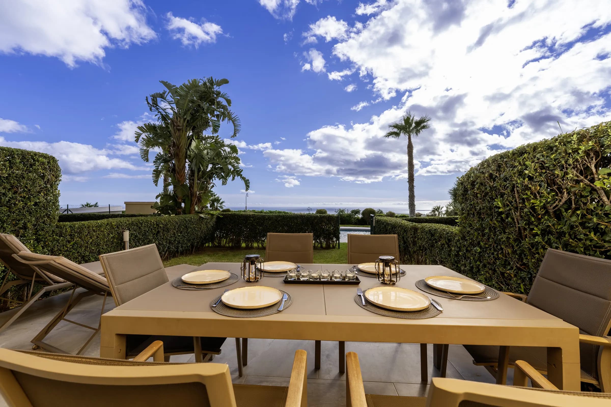 Terrace with outdoor dining and sea views