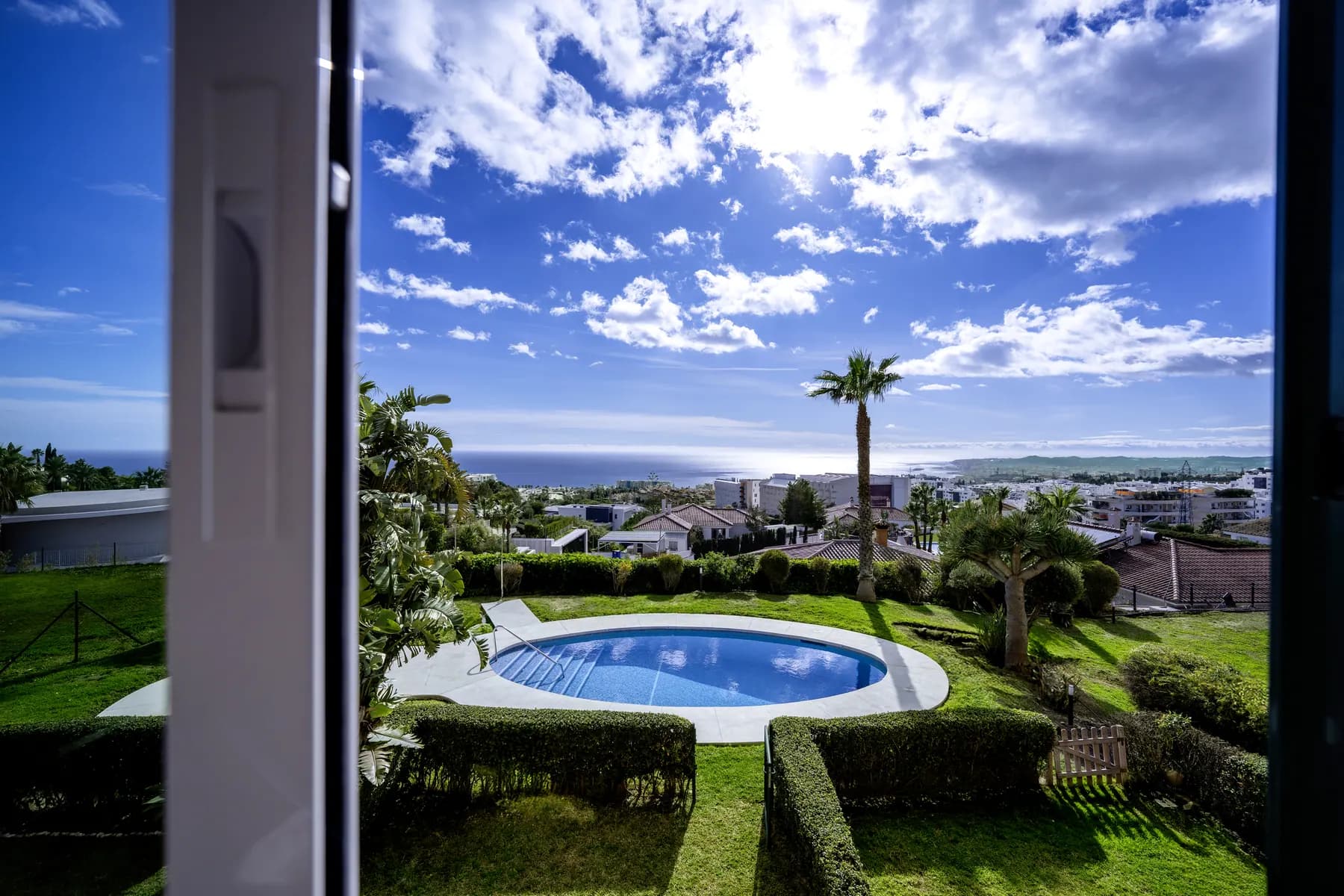Pool and sea seen from the bedroom