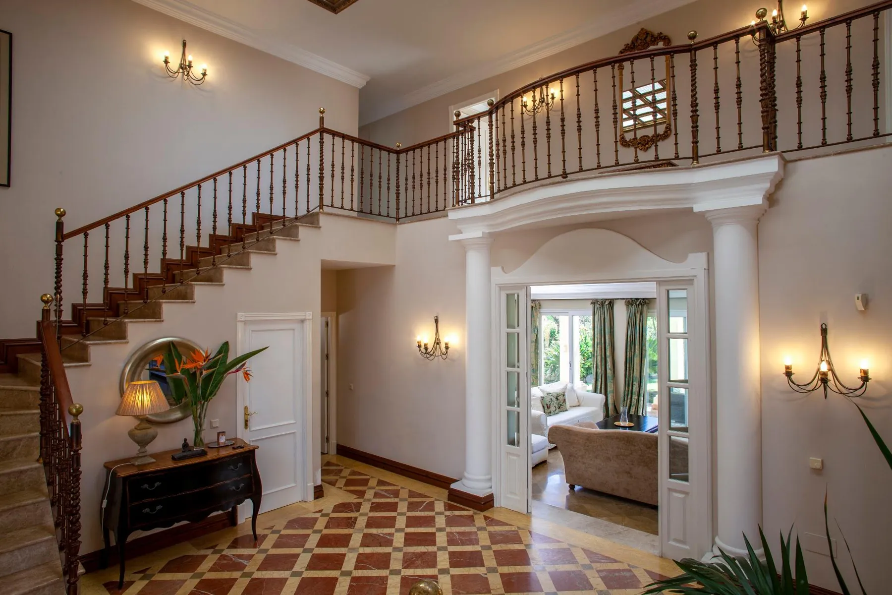 Entrance hall with staircase and gallery