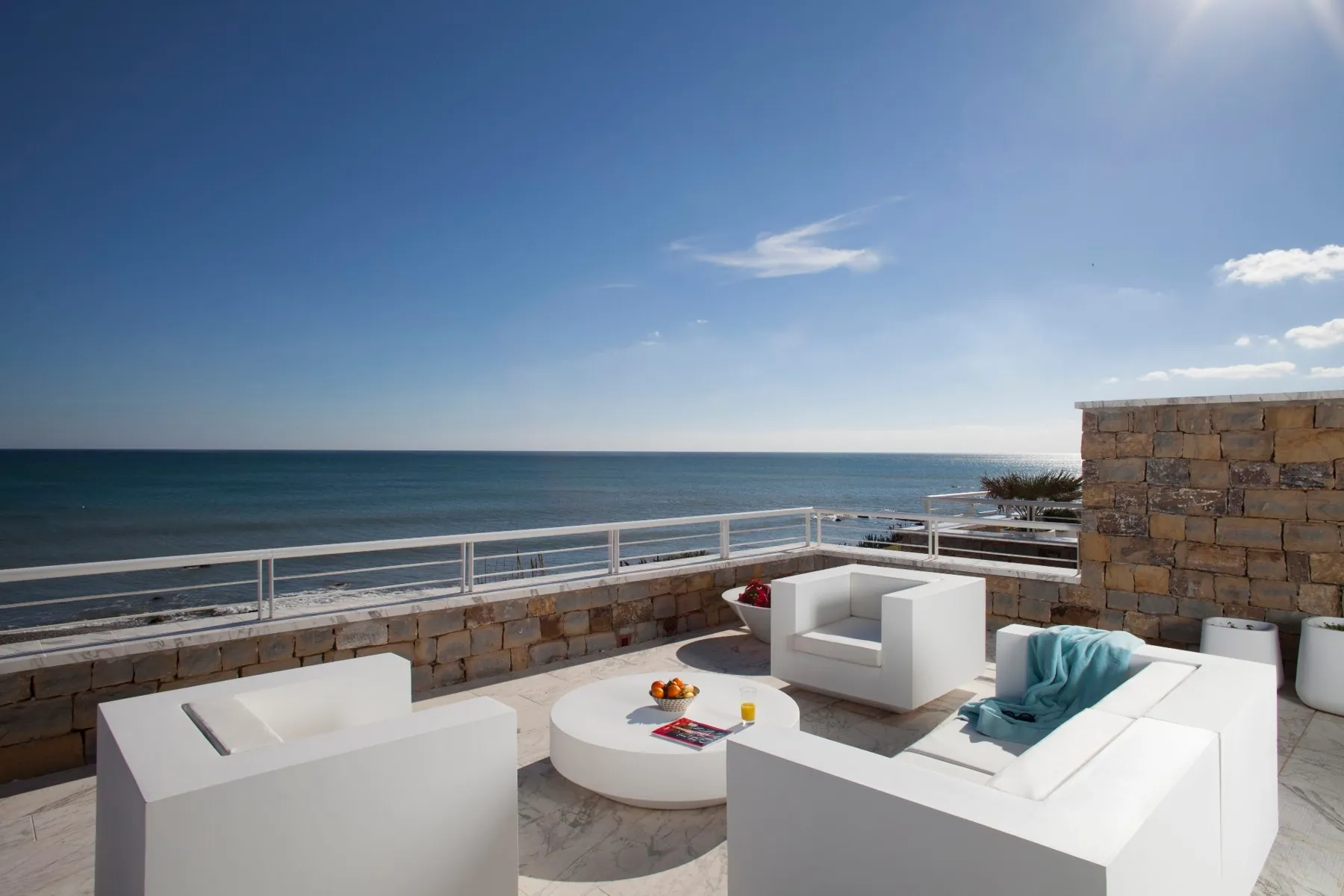 Outdoor lounge above the Mediterranean