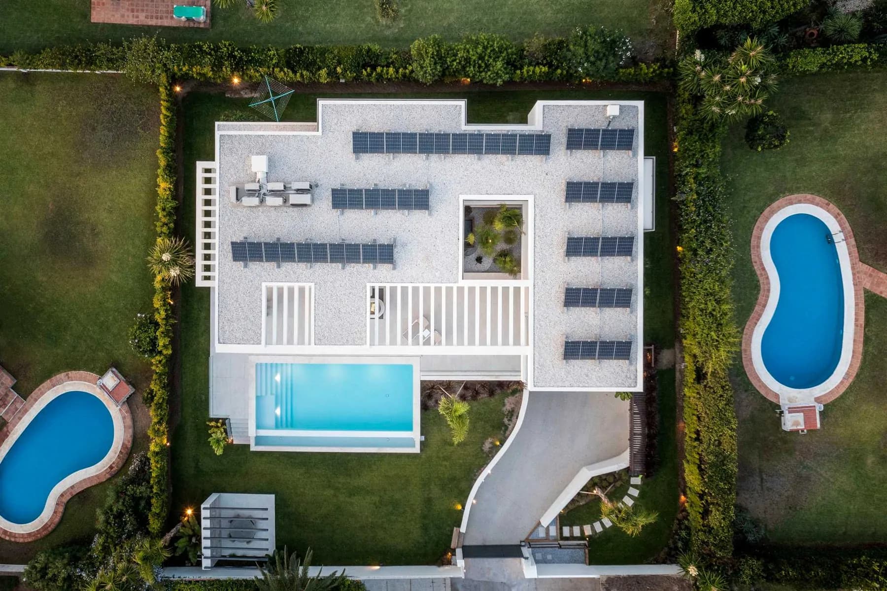 Aerial view of a villa with pool